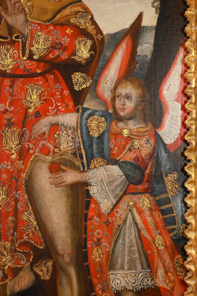 Saint Roch surrounded by an angel and his dog against a landscape background