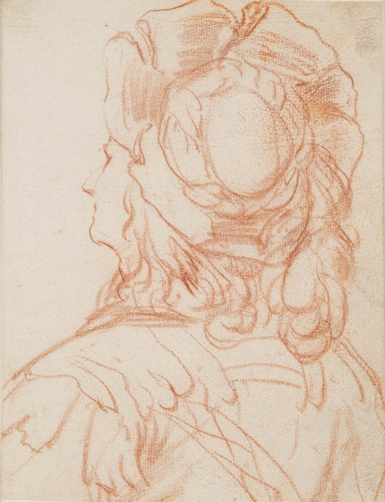 Jeune homme coiffé d’une toque tailladée vu de dos